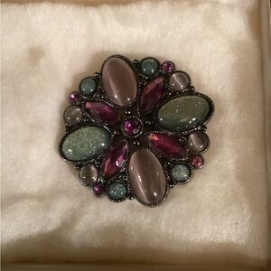 Hardstone brooch in purples and greens